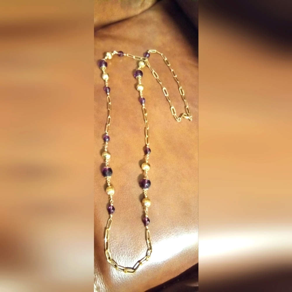 Vintage goldtone and purple crystal long chain Necklace.